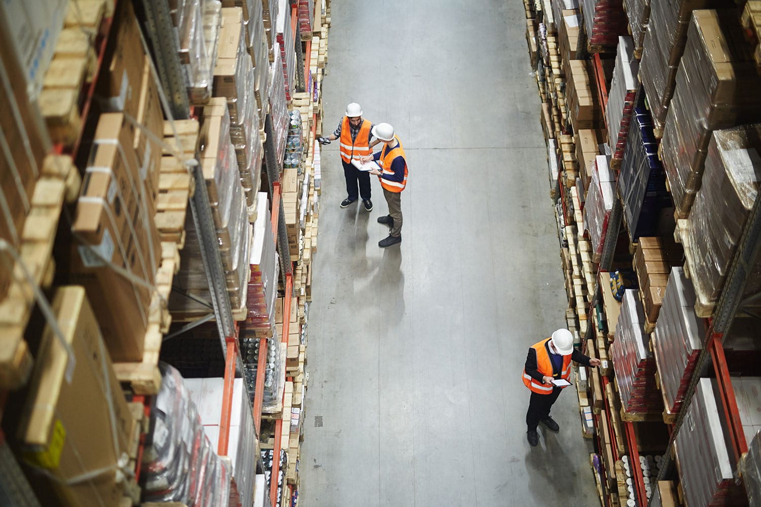 Men doing inventory in the warehouse